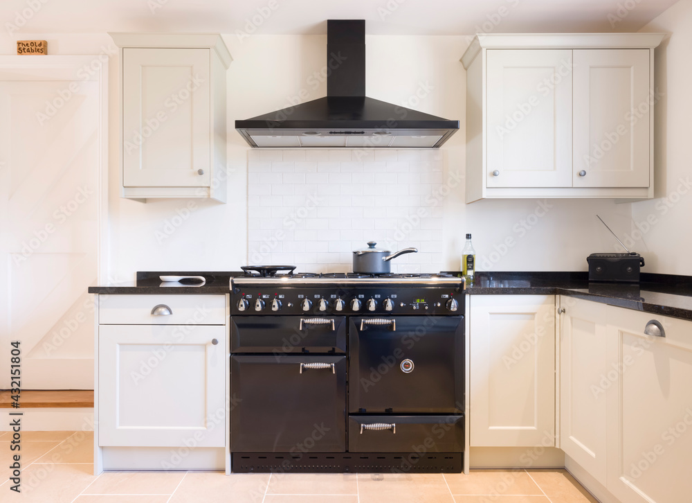 Modern modular kitchen interior, electric range cooker and ovens