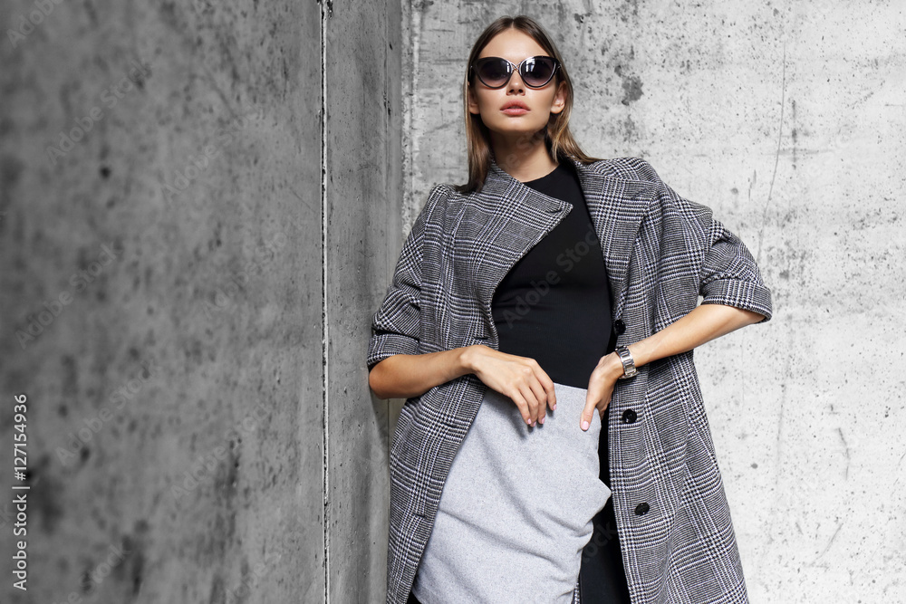 elegant woman outdoor feeling inspired by Jimmy Choo