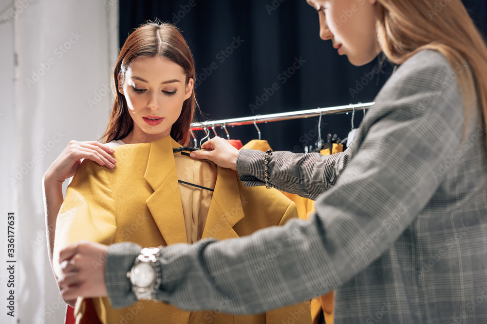 Woman Creating outfit ideas with Our AI assistant
