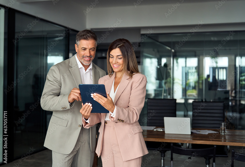A Man and a Woman using a tablet